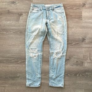 Distressed light color jeans